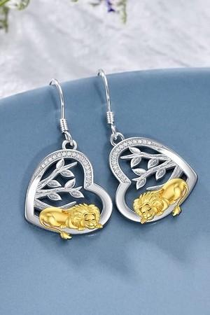 Boucles doreilles femme lion
